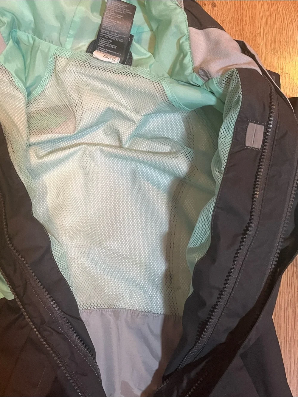 The North Face girls Black & Mint Hooded Rain Jacket